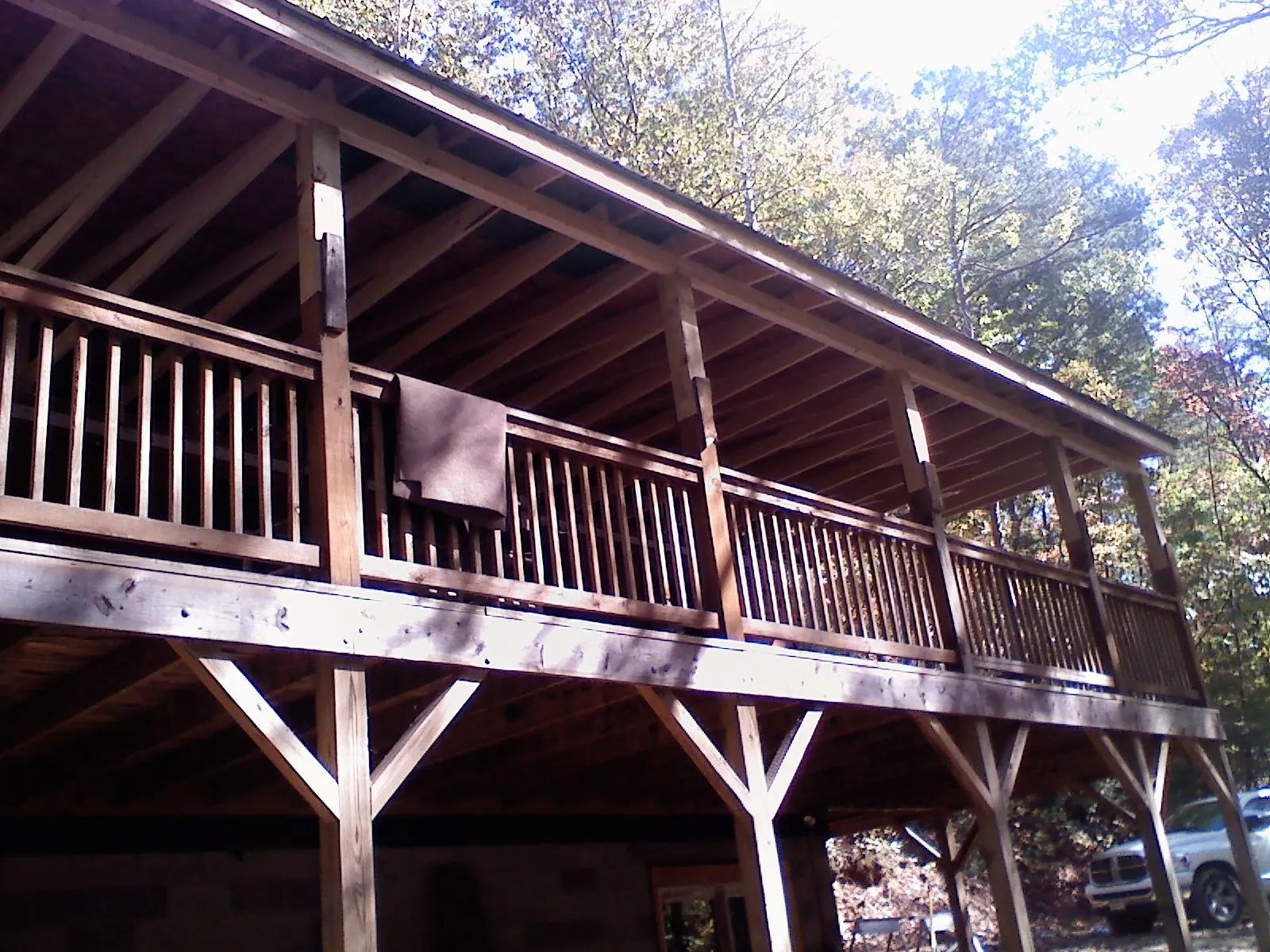 Timber framing under a new elevated porch and deck — Roof Leak Repair in Harmony by Roofing Brothers